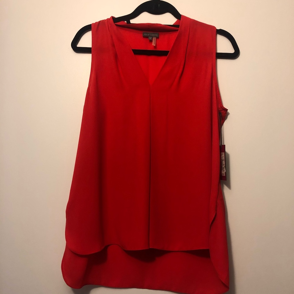 Red sleeveless blouse by Vince Camuto